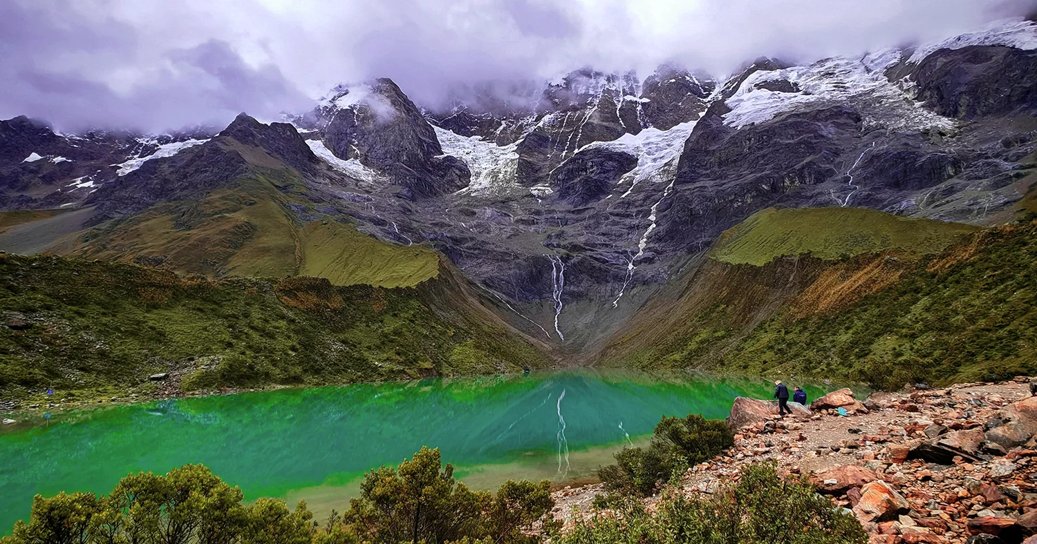 Humantay Lake surrounded by snow-capped mountains near Cusco, Peru