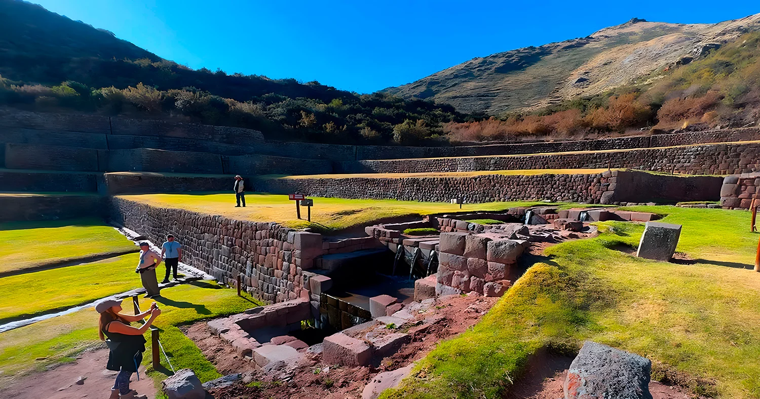 Inca agricultural terraces and stone water channels at Tipon archaeological site in Cusco, Peru