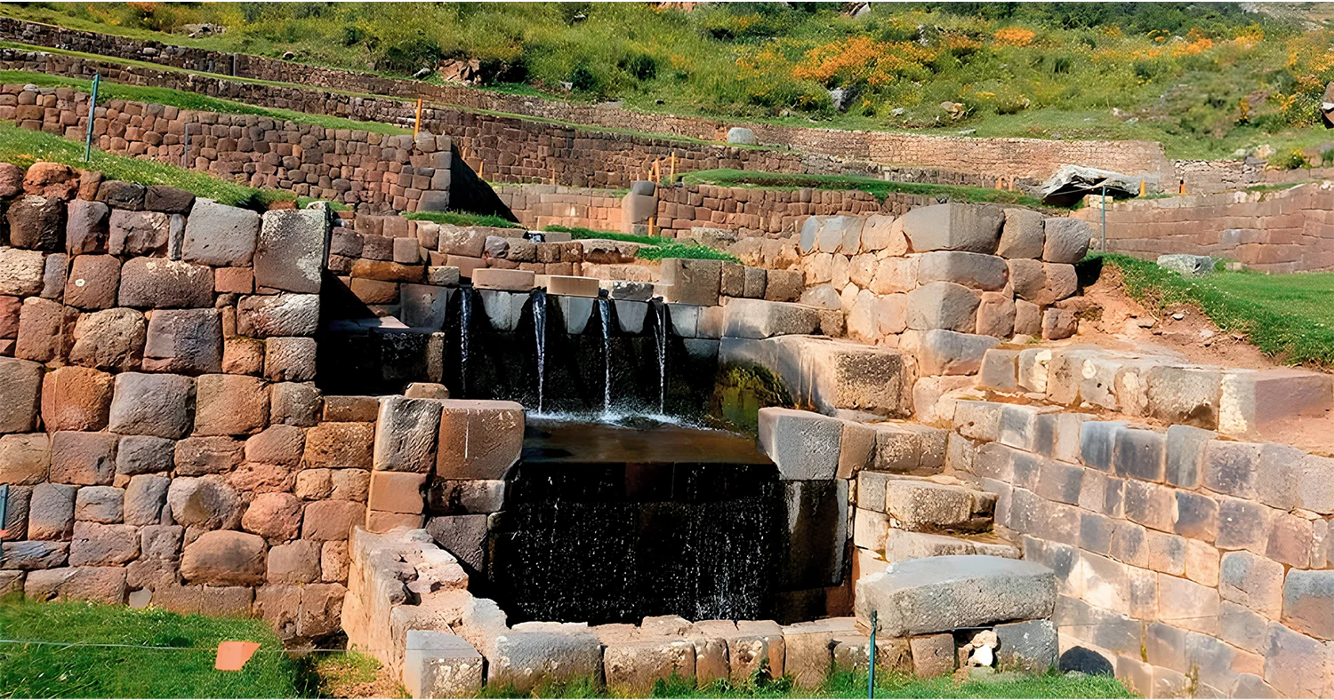 Flowing water through stone channels at Tipon archaeological site near Cusco, Peru