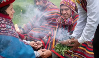 Couple participating in an Andean wedding ritual with Peru Grand Travel