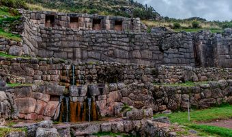 Stone water channels, aqueducts, and terraced fountains at the Tambomachay Inca site